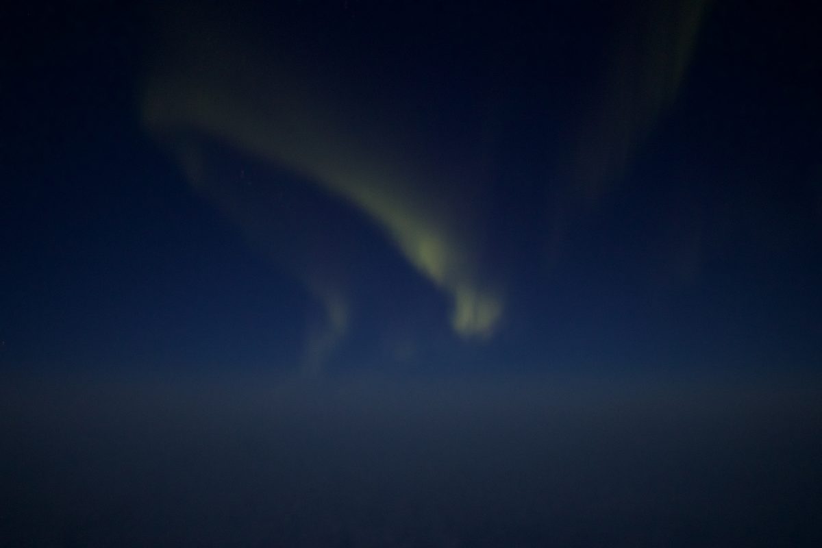Nordlichter auf dem Flug von Spitzbergen nach Tromsø mit SAS